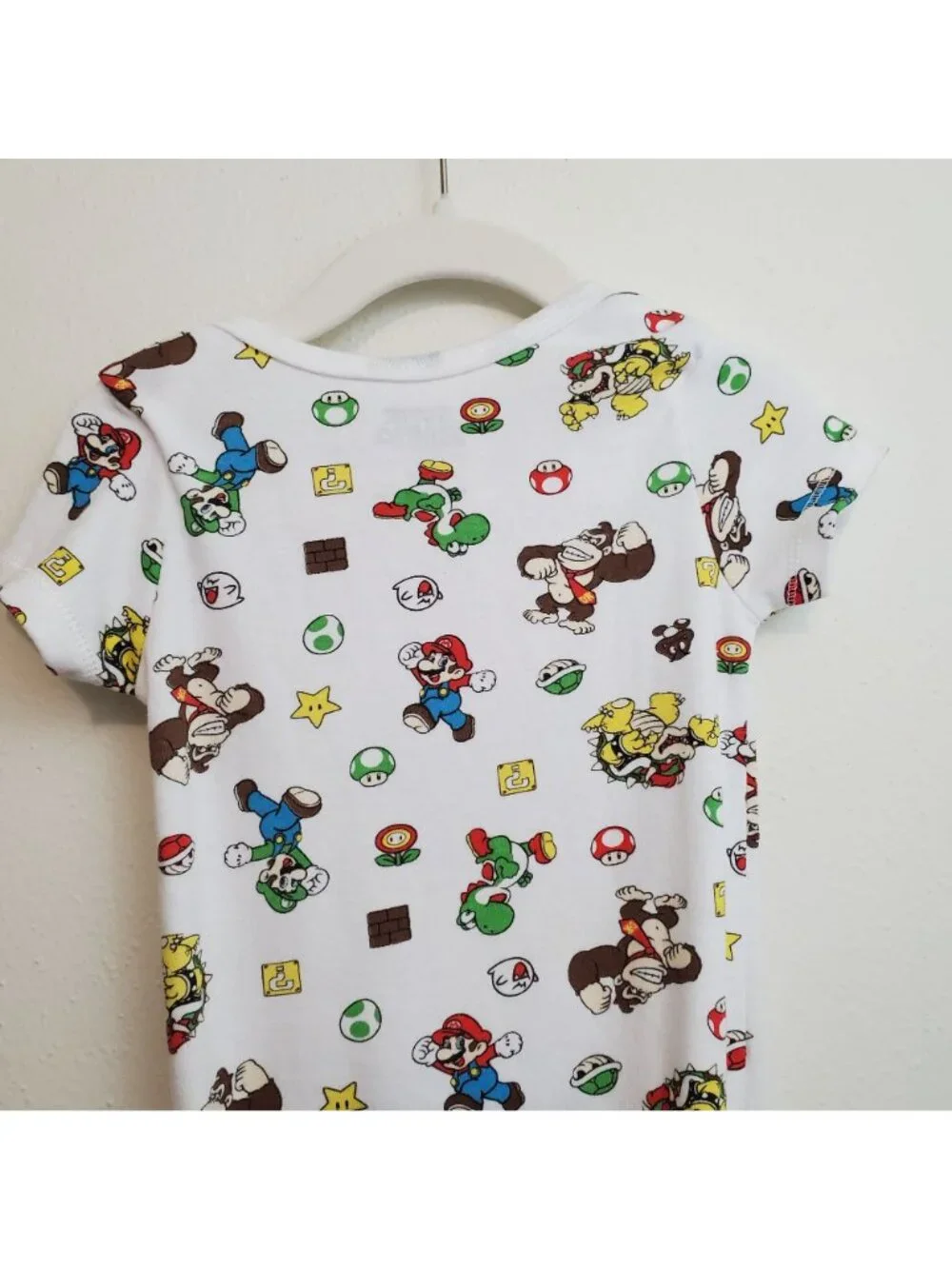 Super Mario Nintendo all-over-print baby onesie